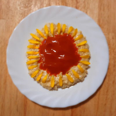 Milchreis mit Hagebuttenmus